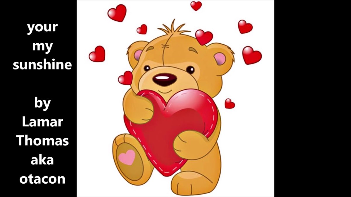 Медвежонок с сердцем в руках