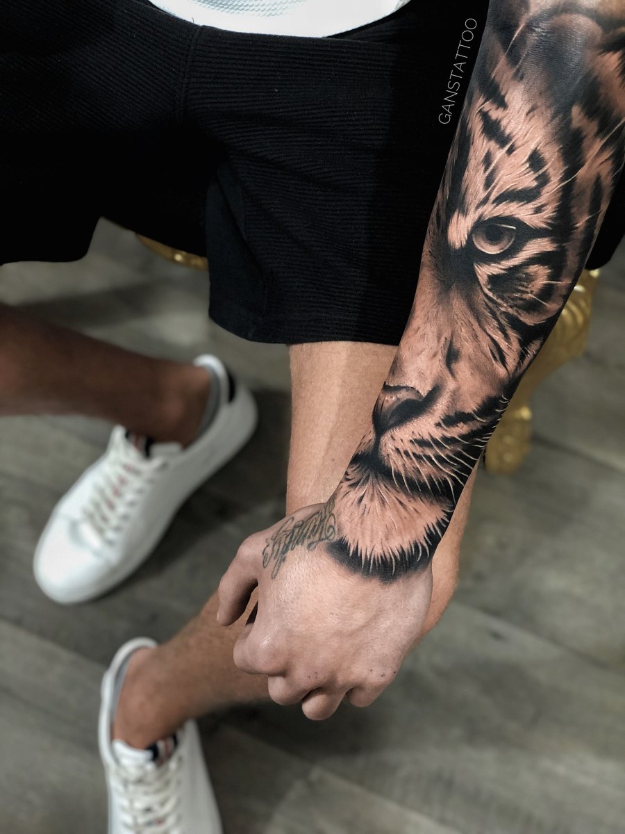 Тату тигр на предплечье для мужчин