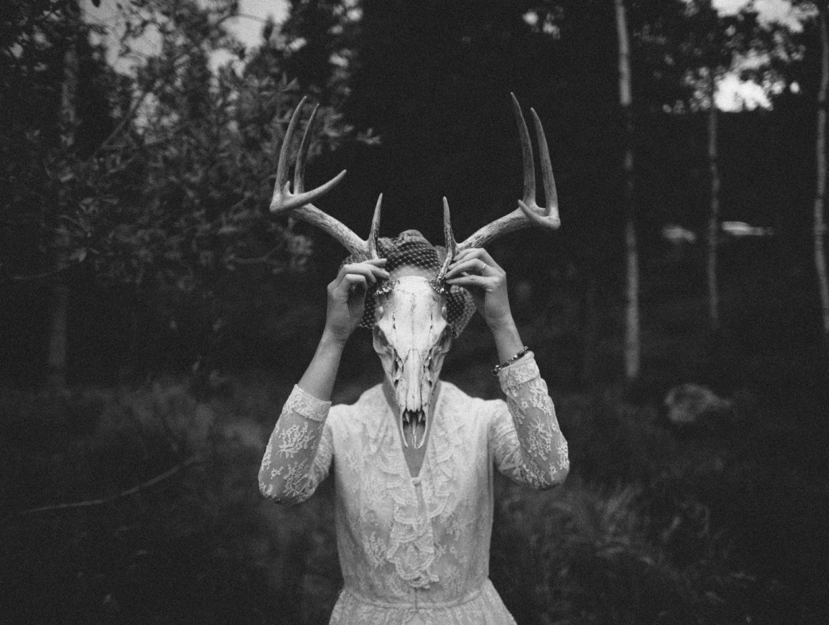 Человек с головой оленя